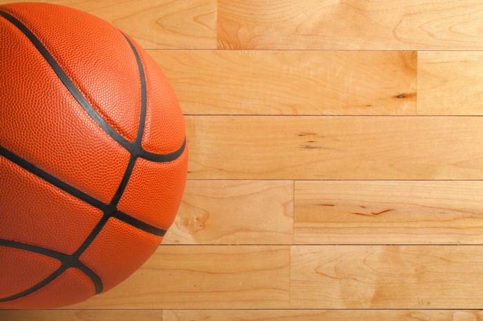 basketball on a maple hardwood court floor 2 1 - Tips Perawatan Harian Lantai Parket Lapangan Basket
